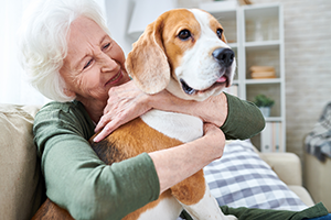 Granny holding dog